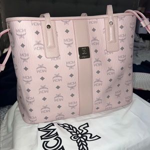 Baby Pink MCM large tote with large pouch inside.